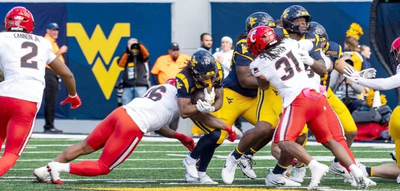 Hawkins leads Mountaineers to game-winning kick against Bearcats